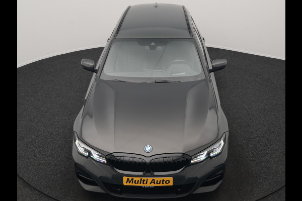 BMW 3 Serie Touring 330e M Sport PHEV 293pk Dealer O.H. Dravitgrau | Head Up | Camera | Laser LED | Sfeerverlichting | Lederen Sportstoelen & Stuur Verwarmd | Apple Carplay | Keyless | Blis | 19"L.M | Virtual | Navigatie | DAB | Plug In Hybrid |