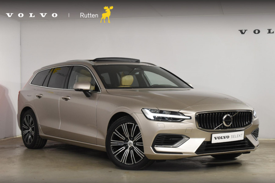 Volvo V60 T6 350PK Plug-in Hybrid AWD Ultimate Bright / Adaptive Cruise Control / Harman Kardon / 360 Camera / Elektrisch glazen schuif-kanteldak / Head-up Display / Nappa leer met stoelventilatie / Elektrisch verstelbare stoelen met geheugen / Stoelverwarming / Stuurverwarming