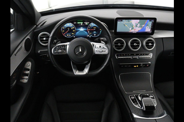 Mercedes-Benz C-Klasse 300e Business Solution AMG Limited | SOH 82,2% | 360 Camera | Stoelverwarming | Leder/Alcantara | Carplay | Matrix LED | Navigatie | Cruise control | Park Assist | Sfeerverlichting | PHEV | Plug In