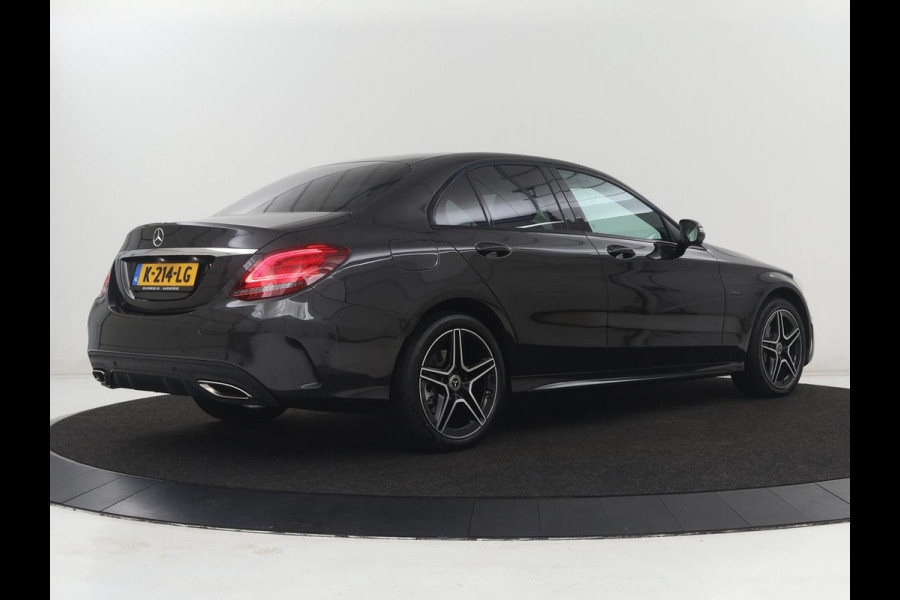 Mercedes-Benz C-Klasse 300e Business Solution AMG Limited | SOH 82,2% | 360 Camera | Stoelverwarming | Leder/Alcantara | Carplay | Matrix LED | Navigatie | Cruise control | Park Assist | Sfeerverlichting | PHEV | Plug In