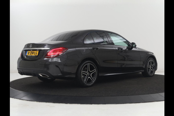 Mercedes-Benz C-Klasse 300e Business Solution AMG Limited | SOH 82,2% | 360 Camera | Stoelverwarming | Leder/Alcantara | Carplay | Matrix LED | Navigatie | Cruise control | Park Assist | Sfeerverlichting | PHEV | Plug In