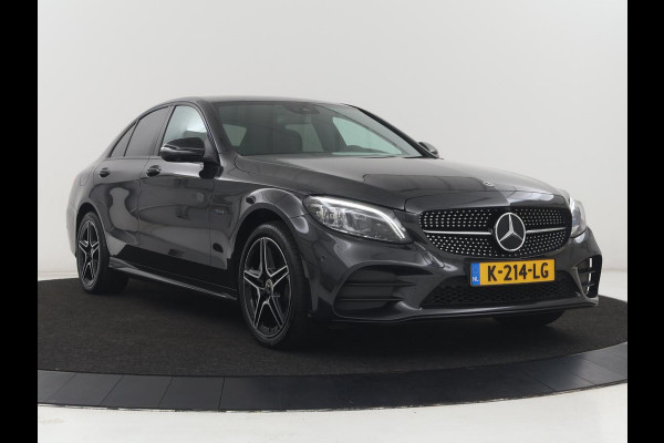 Mercedes-Benz C-Klasse 300e Business Solution AMG Limited | SOH 82,2% | 360 Camera | Stoelverwarming | Leder/Alcantara | Carplay | Matrix LED | Navigatie | Cruise control | Park Assist | Sfeerverlichting | PHEV | Plug In