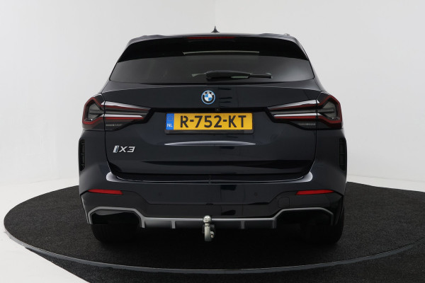 BMW iX3 High Executive 80 kWh M-pakket 97%SoH (1e eigenaar, NL-auto, Dealer OnderH, Panoramadak, Trekhaak, Navi Pro, StoelV, Etc)