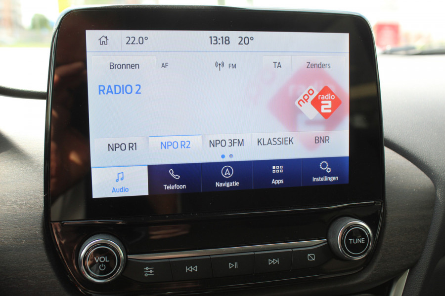 Ford Puma 1.0-125pk EcoBoost Mild-Hybrid Titanium X. Garantie t/m 07-03-2028 ! Slechts 7.400km ! Cruise cntrl, climate cntrl, stoel-, stuur- en voorraamverw., draadloos opladen telefoon, trekhaak afneembaar, navigatie, telefoonvoorb., LM wielen, B&O soundsyst., digitaal dashboard etc.