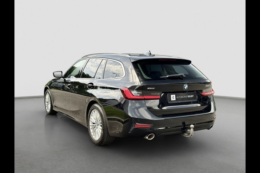 BMW 3 Serie Touring 330e xDrive | Laser | Trekhaak | Head Up | 360 | Sfeerverlichting | Dodehoek | 1e eigenaar