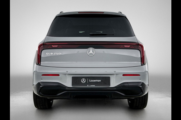 Mercedes-Benz Glb 250+ Business Solution AMG 7p. 85.5 kWh | Premium pakket | Winterpakket | Nightpakket | Parkeerpakket | Trekhaak | GUARD 360° | Warmtewerend, donkergetint glas | Vast panoramadak | 19” vijfspaaks lichtmetalen AMG-velgen |