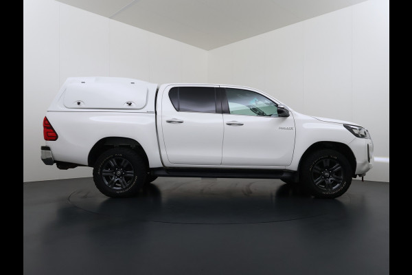 Toyota Hilux 2.4 D-4D 4WD Automaat Double Cab Prof. Lier Canopy Hardtop (Huif) Trekhaak Navi* via Apple Carplay Android Auto Ecc Camera Adap. Lane Assist Inbouw Kasten Bluetooth AWD EURO 6 400Nm 3.500kg Trekvermogen 1e Eigenaar Dealeronderhouden Origineel Nederlandse Auto