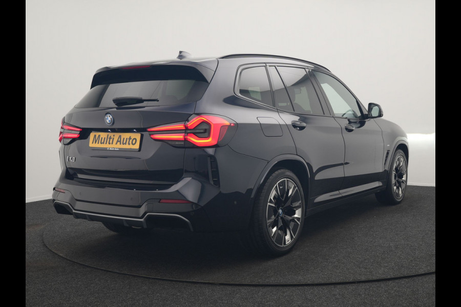 BMW iX3 M Sport 80 kWh 286pk Dealer O.H. | Trekhaak Af Fabriek | Panodak | Head Up | Adaptive Cruise | 360 Camera | Adaptief Onderstel | Harman / Kardon | Lederen Sportstoelen Memory & Verwarmd | Keyless | Blis | Apple Carplay | Sfeerverlichting | Navigatie | DAB | 20"L.M |