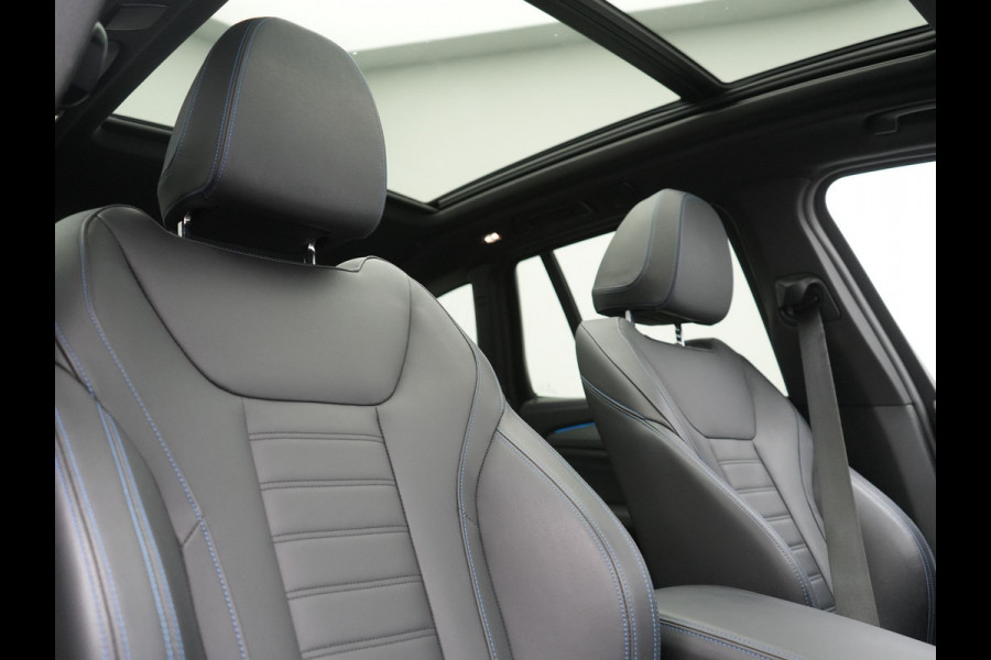 BMW iX3 M Sport 80 kWh 286pk Dealer O.H. | Trekhaak Af Fabriek | Panodak | Head Up | Adaptive Cruise | 360 Camera | Adaptief Onderstel | Harman / Kardon | Lederen Sportstoelen Memory & Verwarmd | Keyless | Blis | Apple Carplay | Sfeerverlichting | Navigatie | DAB | 20"L.M |