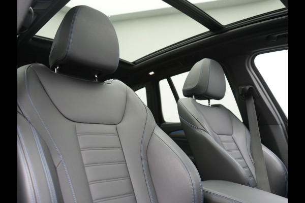 BMW iX3 M Sport 80 kWh 286pk Dealer O.H. | Trekhaak Af Fabriek | Panodak | Head Up | Adaptive Cruise | 360 Camera | Adaptief Onderstel | Harman / Kardon | Lederen Sportstoelen Memory & Verwarmd | Keyless | Blis | Apple Carplay | Sfeerverlichting | Navigatie | DAB | 20"L.M |
