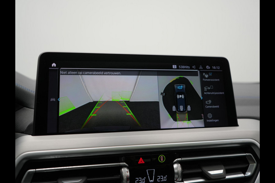 BMW iX3 M Sport 80 kWh 286pk Dealer O.H. | Trekhaak Af Fabriek | Panodak | Head Up | Adaptive Cruise | 360 Camera | Adaptief Onderstel | Harman / Kardon | Lederen Sportstoelen Memory & Verwarmd | Keyless | Blis | Apple Carplay | Sfeerverlichting | Navigatie | DAB | 20"L.M |