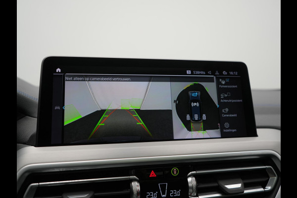 BMW iX3 M Sport 80 kWh 286pk Dealer O.H. | Trekhaak Af Fabriek | Panodak | Head Up | Adaptive Cruise | 360 Camera | Adaptief Onderstel | Harman / Kardon | Lederen Sportstoelen Memory & Verwarmd | Keyless | Blis | Apple Carplay | Sfeerverlichting | Navigatie | DAB | 20"L.M |