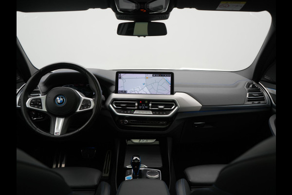 BMW iX3 M Sport 80 kWh 286pk Dealer O.H. | Trekhaak Af Fabriek | Panodak | Head Up | Adaptive Cruise | 360 Camera | Adaptief Onderstel | Harman / Kardon | Lederen Sportstoelen Memory & Verwarmd | Keyless | Blis | Apple Carplay | Sfeerverlichting | Navigatie | DAB | 20"L.M |