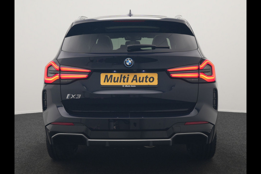 BMW iX3 M Sport 80 kWh 286pk Dealer O.H. | Trekhaak Af Fabriek | Panodak | Head Up | Adaptive Cruise | 360 Camera | Adaptief Onderstel | Harman / Kardon | Lederen Sportstoelen Memory & Verwarmd | Keyless | Blis | Apple Carplay | Sfeerverlichting | Navigatie | DAB | 20"L.M |