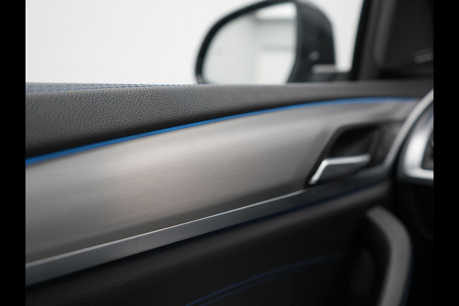 BMW iX3 M Sport 80 kWh 286pk Dealer O.H. | Trekhaak Af Fabriek | Panodak | Head Up | Adaptive Cruise | 360 Camera | Adaptief Onderstel | Harman / Kardon | Lederen Sportstoelen Memory & Verwarmd | Keyless | Blis | Apple Carplay | Sfeerverlichting | Navigatie | DAB | 20"L.M |