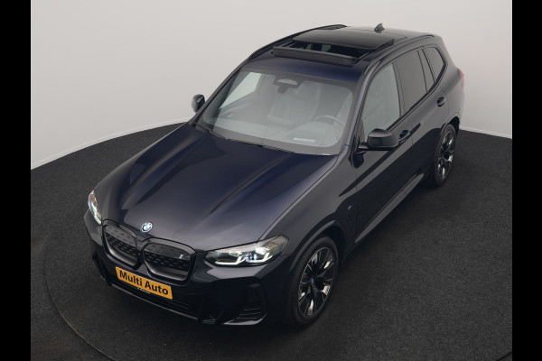 BMW iX3 M Sport 80 kWh 286pk Dealer O.H. | Trekhaak Af Fabriek | Panodak | Head Up | Adaptive Cruise | 360 Camera | Adaptief Onderstel | Harman / Kardon | Lederen Sportstoelen Memory & Verwarmd | Keyless | Blis | Apple Carplay | Sfeerverlichting | Navigatie | DAB | 20"L.M |