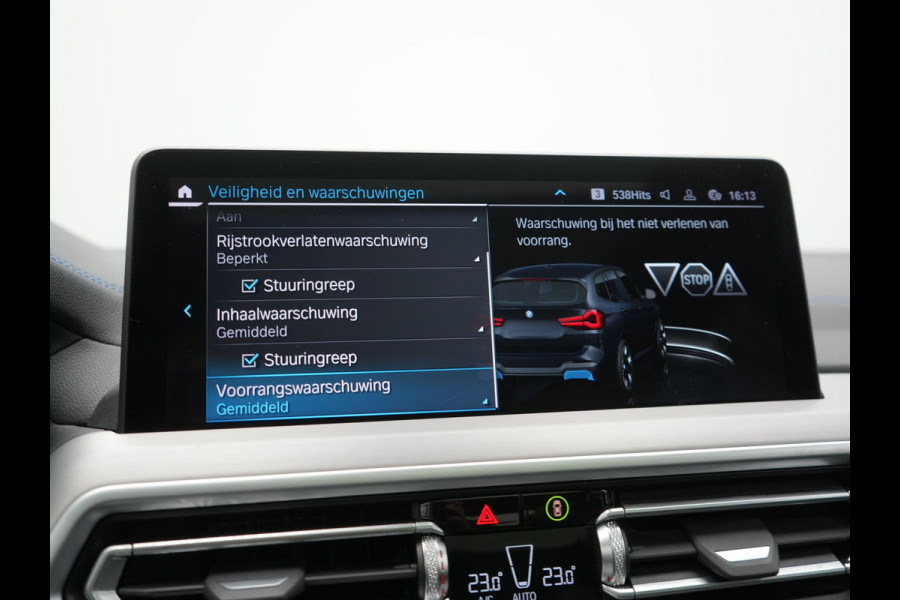 BMW iX3 M Sport 80 kWh 286pk Dealer O.H. | Trekhaak Af Fabriek | Panodak | Head Up | Adaptive Cruise | 360 Camera | Adaptief Onderstel | Harman / Kardon | Lederen Sportstoelen Memory & Verwarmd | Keyless | Blis | Apple Carplay | Sfeerverlichting | Navigatie | DAB | 20"L.M |