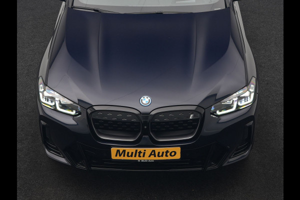 BMW iX3 M Sport 80 kWh 286pk Dealer O.H. | Trekhaak Af Fabriek | Panodak | Head Up | Adaptive Cruise | 360 Camera | Adaptief Onderstel | Harman / Kardon | Lederen Sportstoelen Memory & Verwarmd | Keyless | Blis | Apple Carplay | Sfeerverlichting | Navigatie | DAB | 20"L.M |