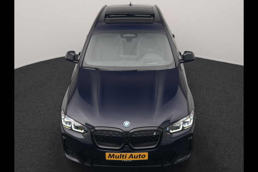 BMW iX3 M Sport 80 kWh 286pk Dealer O.H. | Trekhaak Af Fabriek | Panodak | Head Up | Adaptive Cruise | 360 Camera | Adaptief Onderstel | Harman / Kardon | Lederen Sportstoelen Memory & Verwarmd | Keyless | Blis | Apple Carplay | Sfeerverlichting | Navigatie | DAB | 20"L.M |