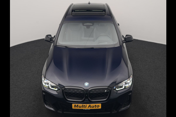 BMW iX3 M Sport 80 kWh 286pk Dealer O.H. | Trekhaak Af Fabriek | Panodak | Head Up | Adaptive Cruise | 360 Camera | Adaptief Onderstel | Harman / Kardon | Lederen Sportstoelen Memory & Verwarmd | Keyless | Blis | Apple Carplay | Sfeerverlichting | Navigatie | DAB | 20"L.M |