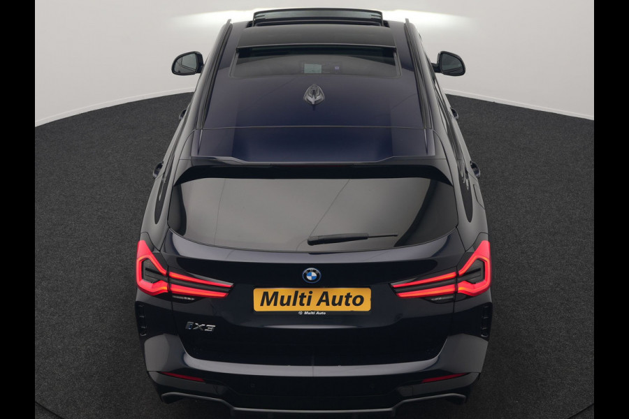 BMW iX3 M Sport 80 kWh 286pk Dealer O.H. | Trekhaak Af Fabriek | Panodak | Head Up | Adaptive Cruise | 360 Camera | Adaptief Onderstel | Harman / Kardon | Lederen Sportstoelen Memory & Verwarmd | Keyless | Blis | Apple Carplay | Sfeerverlichting | Navigatie | DAB | 20"L.M |