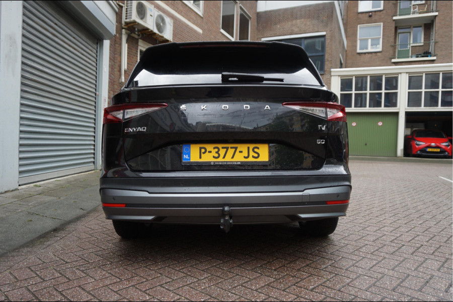 Škoda ENYAQ iV 60 | NL Auto | 1ste eigenaar | Trekhaak | Adaptive+Lane | Sfeer | 20inch | Leer/ stof | Luxe zeer nette auto