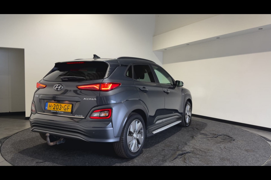 Hyundai Kona EV Premium 64 kWh | Voorstoelen verwarmd & gekoeld | Trekhaak | Warmtepomp | Soh (batterijcheck) Waarde 90,4 %