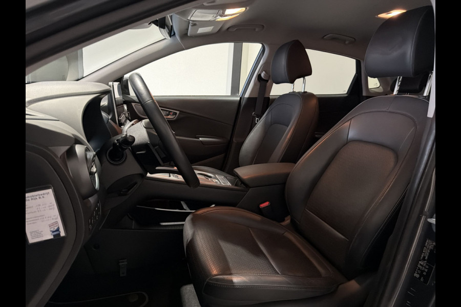 Hyundai Kona EV Premium 64 kWh | Voorstoelen verwarmd & gekoeld | Trekhaak | Warmtepomp | Soh (batterijcheck) Waarde 90,4 %