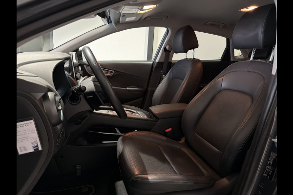 Hyundai Kona EV Premium 64 kWh | Voorstoelen verwarmd & gekoeld | Trekhaak | Warmtepomp | Soh (batterijcheck) Waarde 90,4 %