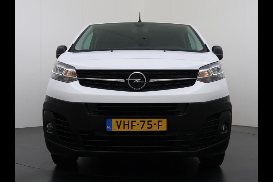 Opel Vivaro 2.0CDTI 123PK L2H1 3-Persoons Trekhaak 360°Camera Euro 6 Navi Airco Apple Carplay Android Auto Cruise Control Pdc Edition Dakdragers Betonplex vloer Inbouwkasten Regen-Lichtsensor 1e Eigenaar 2.500KG Trekgewicht Dealeronderhouden