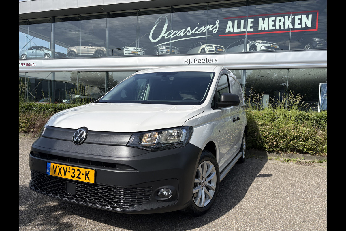 Volkswagen Caddy Cargo 2.0 TDI Airco - Apple carplay - Navigatie - Parkeersensor achter - Zijschuifdeur links/ rechts - Tussenschot volledig - Cruise control - Mistlampen - Bluetooth - Stuur multifunctioneel - Elektrische ramen - Start/stop systeem