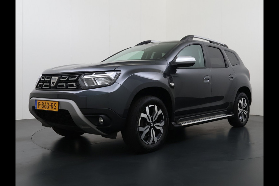 Dacia Duster 1.3TCe 131PK Prestige Trekhaak Navi Camera Apple Carplay Android Auto Ecc Bluetooth Cruise Control Pdc Dodehoek Signalering Isofix Privacy Glas Sidesteps Lmv ESP 1.500KG Trekgewicht Origineel Nederlandse Auto