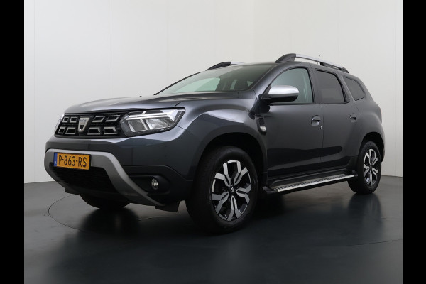 Dacia Duster 1.3TCe 131PK Prestige Trekhaak Navi Camera Apple Carplay Android Auto Ecc Bluetooth Cruise Control Pdc Dodehoek Signalering Isofix Privacy Glas Sidesteps Lmv ESP 1.500KG Trekgewicht Origineel Nederlandse Auto