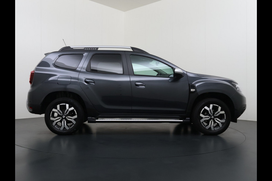 Dacia Duster 1.3TCe 131PK Prestige Trekhaak Navi Camera Apple Carplay Android Auto Ecc Bluetooth Cruise Control Pdc Dodehoek Signalering Isofix Privacy Glas Sidesteps Lmv ESP 1.500KG Trekgewicht Origineel Nederlandse Auto