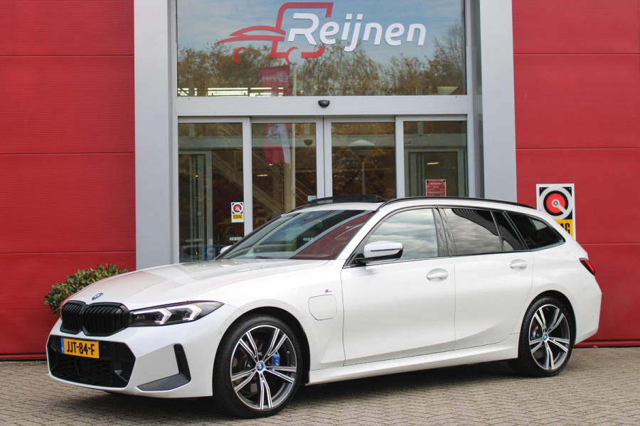 BMW 3 Serie Touring 330e 292PK M-SPORT | PANORAMISCH SCHUIF/KANTEL DAK | M-SPORT PRO-PAKKET | M-SPORT REMMEN UITGEVOERD IN DONKERBLAUW MET M LOGO | BMW LIVE COCKPIT PROFESSIONAL | CURVED DISPLAY |DRIVING ASSISTANT INCL. HEAD-UP DISPLAY | PARKING ASSIST INCL. ACHTERUITRIJCAMERA | ADAPTIEVE LED KOPLAMPEN |SHADOW LINE | M-SPORTSTOELEN VOOR | LEDER VERNASCA MET CONTRAST STIKSELS M-SPORT | STOEL VERWARMING | DRAADLOZE APPLE CARPLAY | ELEKTRISCH VERSTELBARE STOELEN MET GEHEUGEN FUNCTIE | HEAD UP DISPLAY | DRAADLOZE TELEFOONLADER | DODEHOEK BEWAKING | COMFORT PACK INCL. ELEKTRISCHE ACHTE