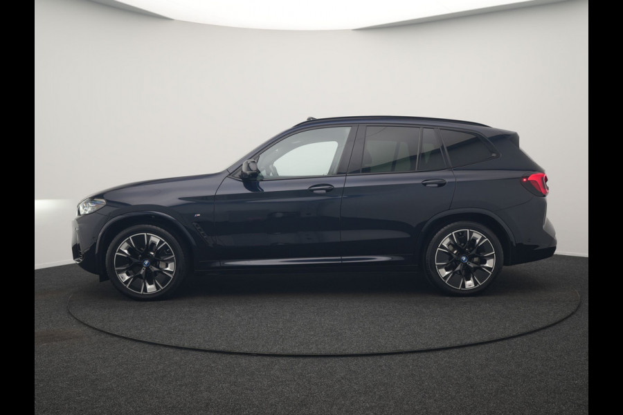 BMW iX3 M Sport 80 kWh 286pk Dealer O.H. | Trekhaak Af Fabriek | Panodak | Head Up | 360 Camera | Harman / Kardon | Lederen Sportstoelen Memory & Verwarmd | Keyless | Blis | Sfeerverlichting | 20"L.M | Adaptive LED |