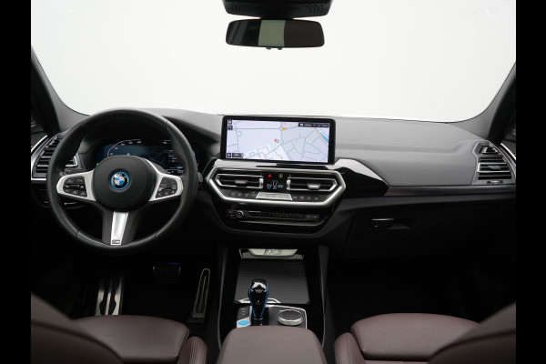 BMW iX3 M Sport 80 kWh 286pk Dealer O.H. | Trekhaak Af Fabriek | Panodak | Head Up | 360 Camera | Harman / Kardon | Lederen Sportstoelen Memory & Verwarmd | Keyless | Blis | Sfeerverlichting | 20"L.M | Adaptive LED |