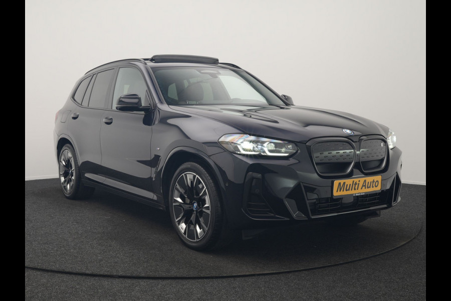 BMW iX3 M Sport 80 kWh 286pk Dealer O.H. | Trekhaak Af Fabriek | Panodak | Head Up | 360 Camera | Harman / Kardon | Lederen Sportstoelen Memory & Verwarmd | Keyless | Blis | Sfeerverlichting | 20"L.M | Adaptive LED |