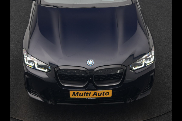 BMW iX3 M Sport 80 kWh 286pk Dealer O.H. | Trekhaak Af Fabriek | Panodak | Head Up | 360 Camera | Harman / Kardon | Lederen Sportstoelen Memory & Verwarmd | Keyless | Blis | Sfeerverlichting | 20"L.M | Adaptive LED |