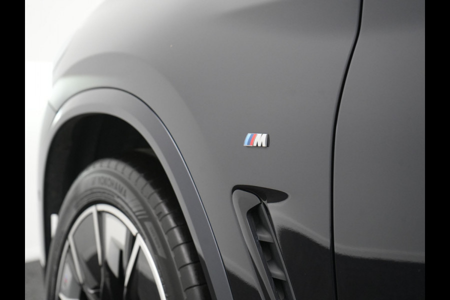 BMW iX3 M Sport 80 kWh 286pk Dealer O.H. | Trekhaak Af Fabriek | Panodak | Head Up | 360 Camera | Harman / Kardon | Lederen Sportstoelen Memory & Verwarmd | Keyless | Blis | Sfeerverlichting | 20"L.M | Adaptive LED |