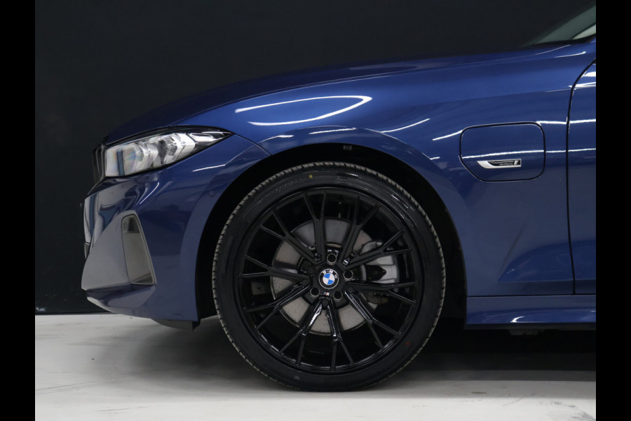 BMW 3 Serie Touring 320e FACELIFT SOH 94% [TREKHAAK UITKLAPBAAR, SOH: 94%, APPLE CARPLAY, ELEKTRISCH VERSTELBARE STOELEN, CAMERA, PDC V+A, VOL LEDER, LED, CRUISE CONTROL, NIEUWSTAAT]