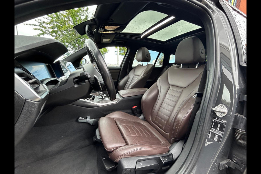 BMW 3 Serie Touring 330i High Exe. M Sport / Panoramadak / Camera / Leder / CarPlay / 19'' / Sportstoelen / Stoelverwarming / DAB / Cruise Control / Getint glas