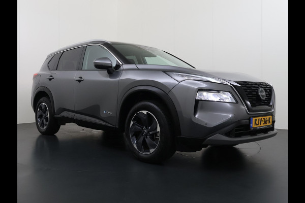 Nissan X-Trail 1.5 e-4orce N-Connecta Family Pack VAN: 44.900,- VOOR: 41.877,- UW WKVOORDEEL: 3.023,- | VOLLEDIGE FABRIEKS GARANTIE TOT 03-2028 | VOOR & ACHTERSTOELEN VERWARMD | STUURWIEL VERWARMD | 7 PERSOONS! | KEYLESS | DODE HOEK | 360 CAMERA | APPLECARPLAY | ADAP. CRUISE |