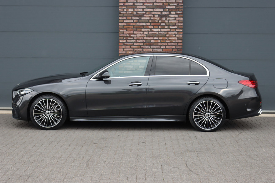 Mercedes-Benz C-Klasse 300 e 4MATIC AMG Line | Massage | HUD | Memory | Leder | Keyless Go | Dodehoekassistent | Digital Light |  Augmented Reality | Surround Camera | Advanced Sound System |