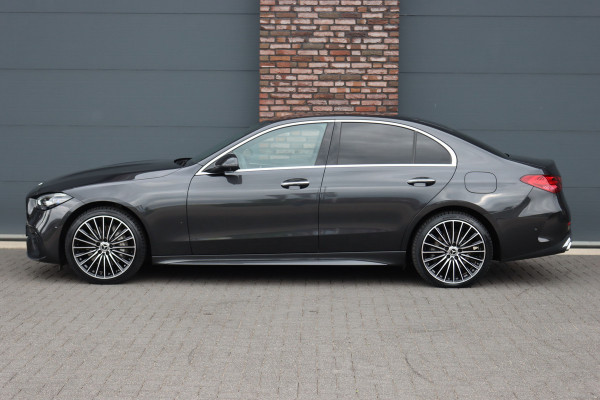 Mercedes-Benz C-Klasse 300 e 4MATIC AMG Line | Massage | HUD | Memory | Leder | Keyless Go | Dodehoekassistent | Digital Light |  Augmented Reality | Surround Camera | Advanced Sound System |