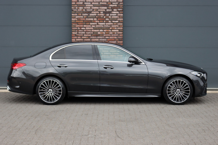 Mercedes-Benz C-Klasse 300 e 4MATIC AMG Line | Massage | HUD | Memory | Leder | Keyless Go | Dodehoekassistent | Digital Light |  Augmented Reality | Surround Camera | Advanced Sound System |