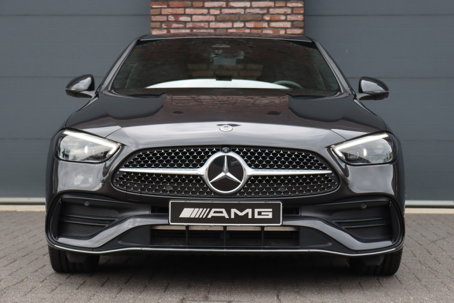 Mercedes-Benz C-Klasse 300 e 4MATIC AMG Line | Massage | HUD | Memory | Leder | Keyless Go | Dodehoekassistent | Digital Light |  Augmented Reality | Surround Camera | Advanced Sound System |