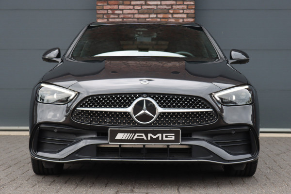 Mercedes-Benz C-Klasse 300 e 4MATIC AMG Line | Massage | HUD | Memory | Leder | Keyless Go | Dodehoekassistent | Digital Light |  Augmented Reality | Surround Camera | Advanced Sound System |