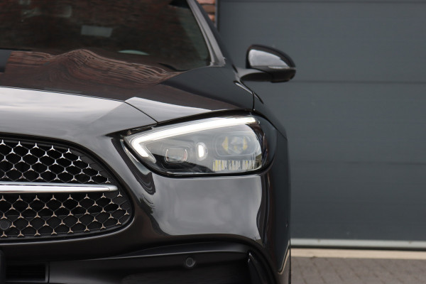 Mercedes-Benz C-Klasse 300 e 4MATIC AMG Line | Massage | HUD | Memory | Leder | Keyless Go | Dodehoekassistent | Digital Light |  Augmented Reality | Surround Camera | Advanced Sound System |