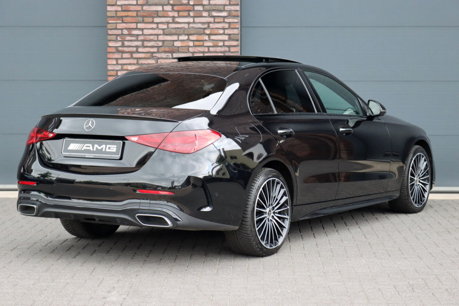 Mercedes-Benz C-Klasse 300 e 4MATIC AMG Line | Distronic+ | Massage | Burmester | Panoramadak | Memory | Digital Light | HUD | Surround Camera | Augmented Reality | Verwarmd Stuurwiel |